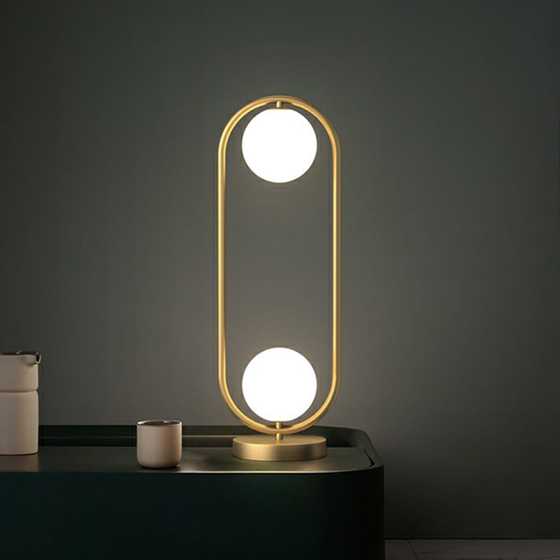 Lampe de chevet à deux globes - Finition dorée avec abat-jour en verre et cadre ovale